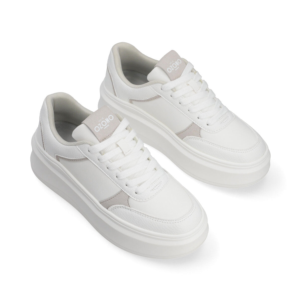 Tenis en color blanco con detalles en gris de la marca Capa de Ozono