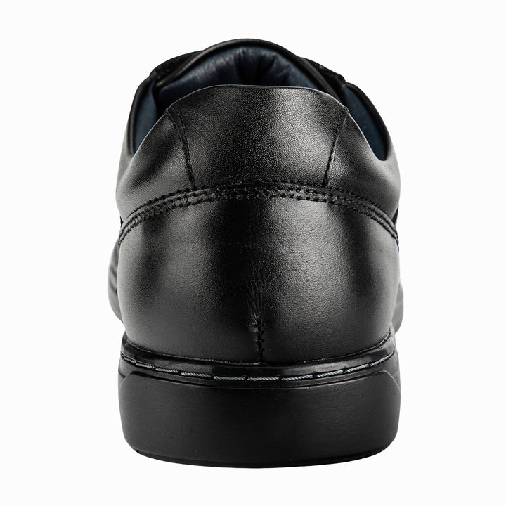 zapato casual de hombre de la marca Merano,  de color negro y con un sistema de cierre de velcro. parte trasera