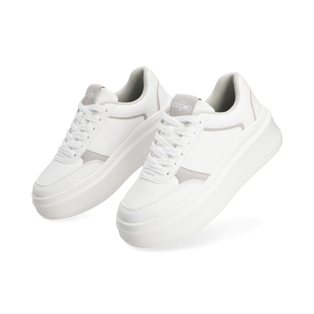 Tenis en color blanco con detalles en gris de la marca Capa de Ozono