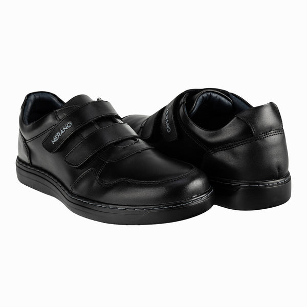zapato casual de hombre de la marca Merano,  de color negro y con un sistema de cierre de velcro. par